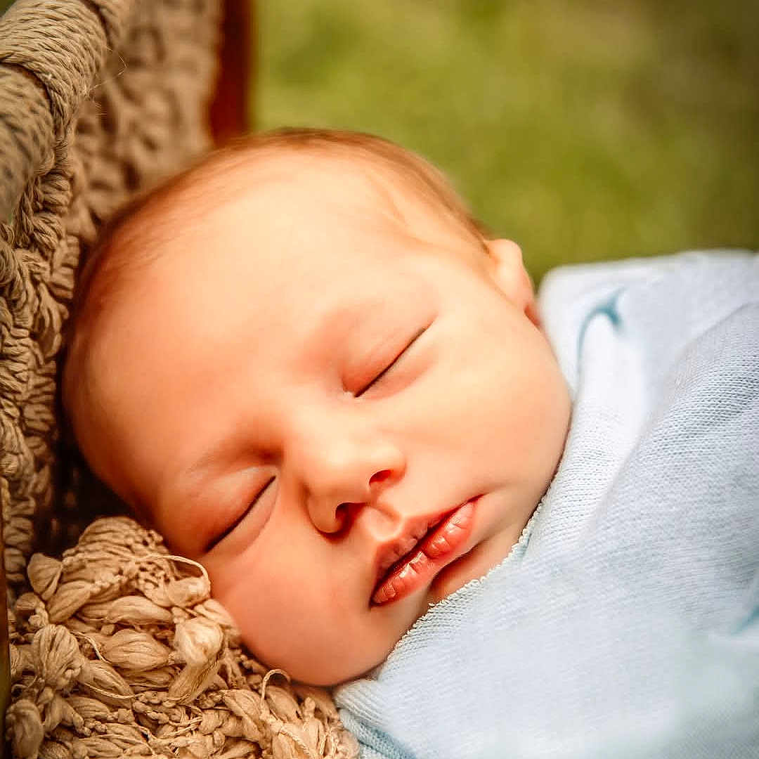 Oliver joined the competition — help win amazing prizes! baby, blanket, calm, child, closeup, cushion, cute, face, indoors, infant, natural_light, newborn, peaceful, portrait, resting, sleeping, soft, texture, woven, wrapped