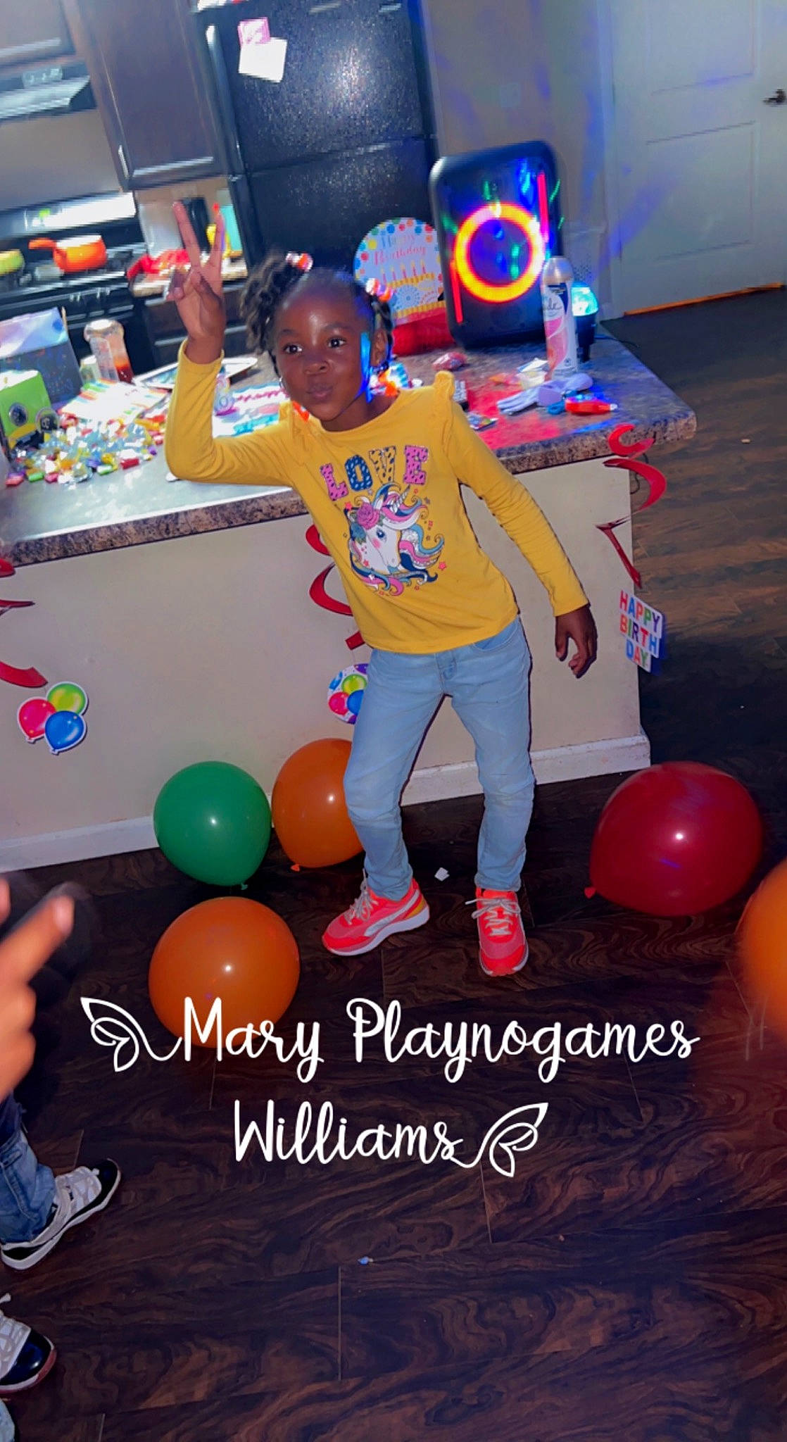 Jayda is registered to the contest to win money with this photo: animation, balloon, child, event, font, fun, happy, leg, leisure, party, party_supply, person, photo_caption, play, recreation, shoe, smile, sneakers, thigh, toddler