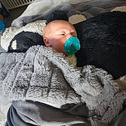Theo joined the competition — help win amazing prizes! baby, pacifier, blanket, pillow, sleeping, infant, cozy, resting, soft, indoor, bed, comfort, child, cute, plush, fabric, relaxation, snuggle, portrait, peaceful