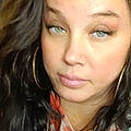 Gina M.
