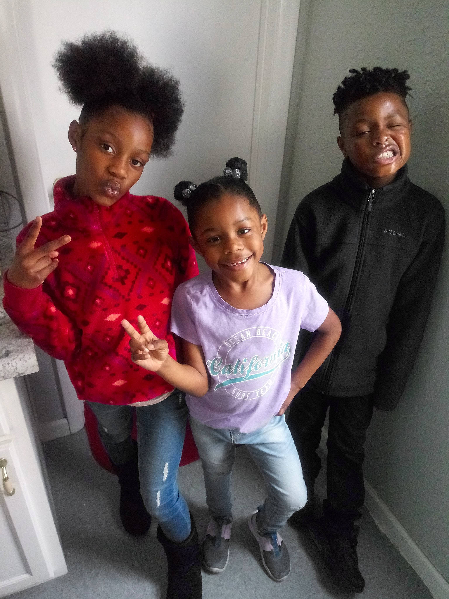 A'Mya joined the competition — help win amazing prizes! afro, black_hair, child, family, fun, hairstyle, joy, people, person, smile, t_shirt, toddler