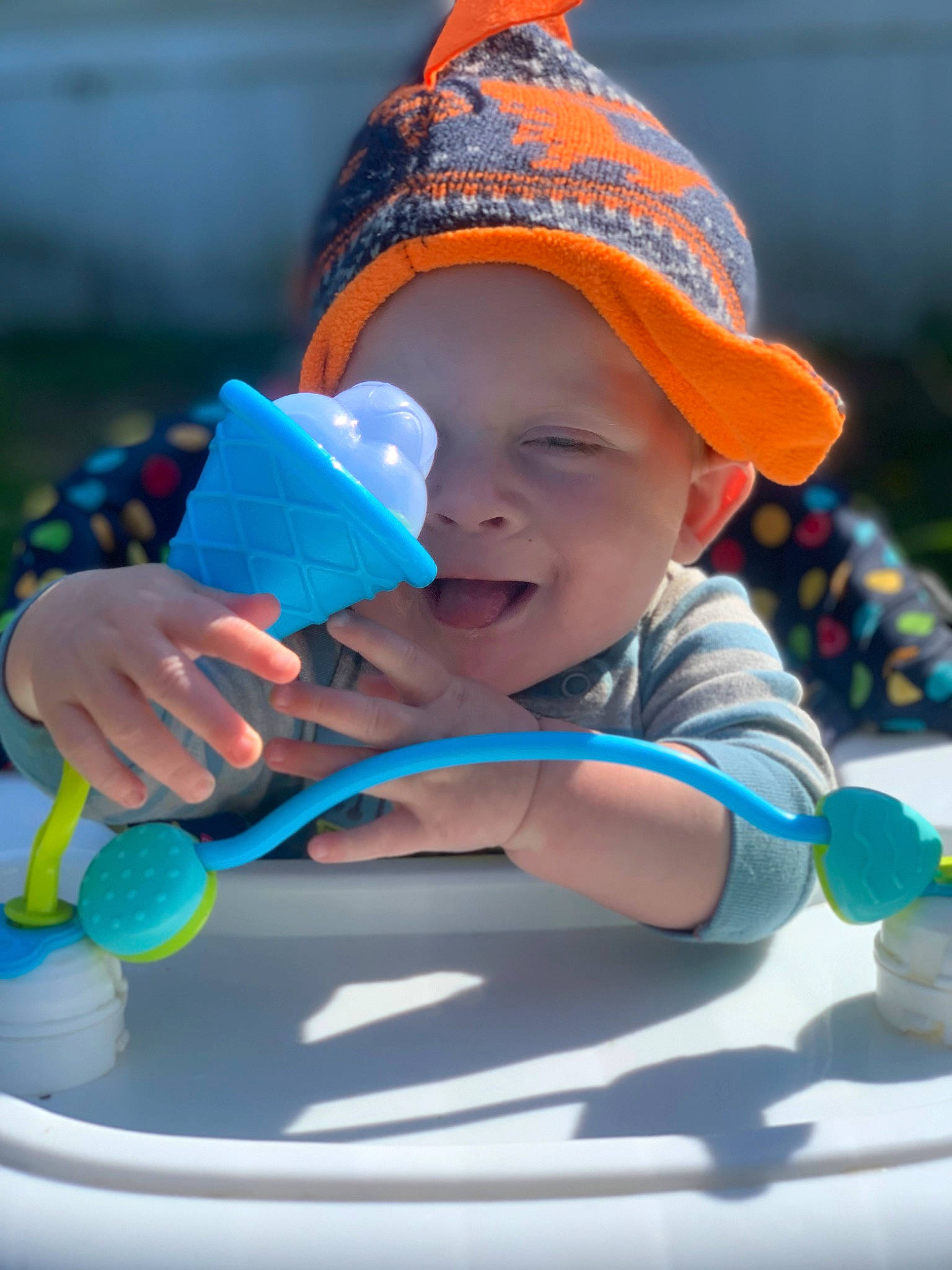Gavin is registered to the contest to win money with this photo: azure, baby, baby_playing_with_toys, baby_products, baby_toddler_clothing, baseball_cap, cap, child, electric_blue, facial_expression, fun, happy, hat, headwear, leisure, person, product, recreation, smile, sun_hat