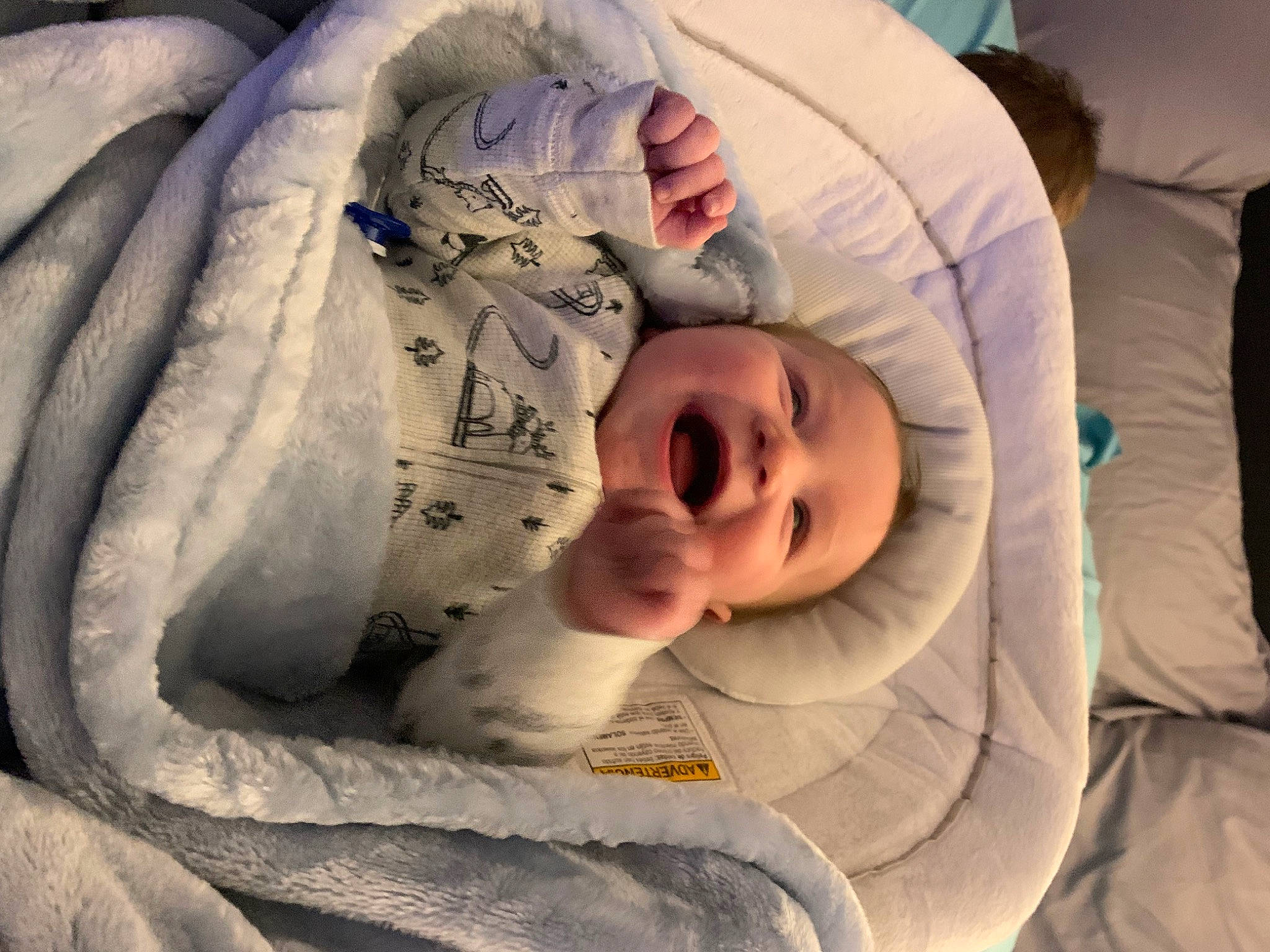 Jamie is registered to the contest to win money with this photo: baby, baby_products, baby_sleeping, baby_toddler_clothing, bedding, bedtime, carmine, cheek, child, comfort, fun, happy, headwear, linens, mouth, person, product, room, sleeve, smile