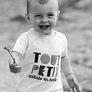 Lewis a rejoint le concours — aidez-le/la à gagner de superbes lots ! toddler, child, smiling, black_and_white, shirt, shorts, stick, outdoor, portrait, happy, walking, hair, face, person, young_child, expression, playful, cute, monochrome, nature