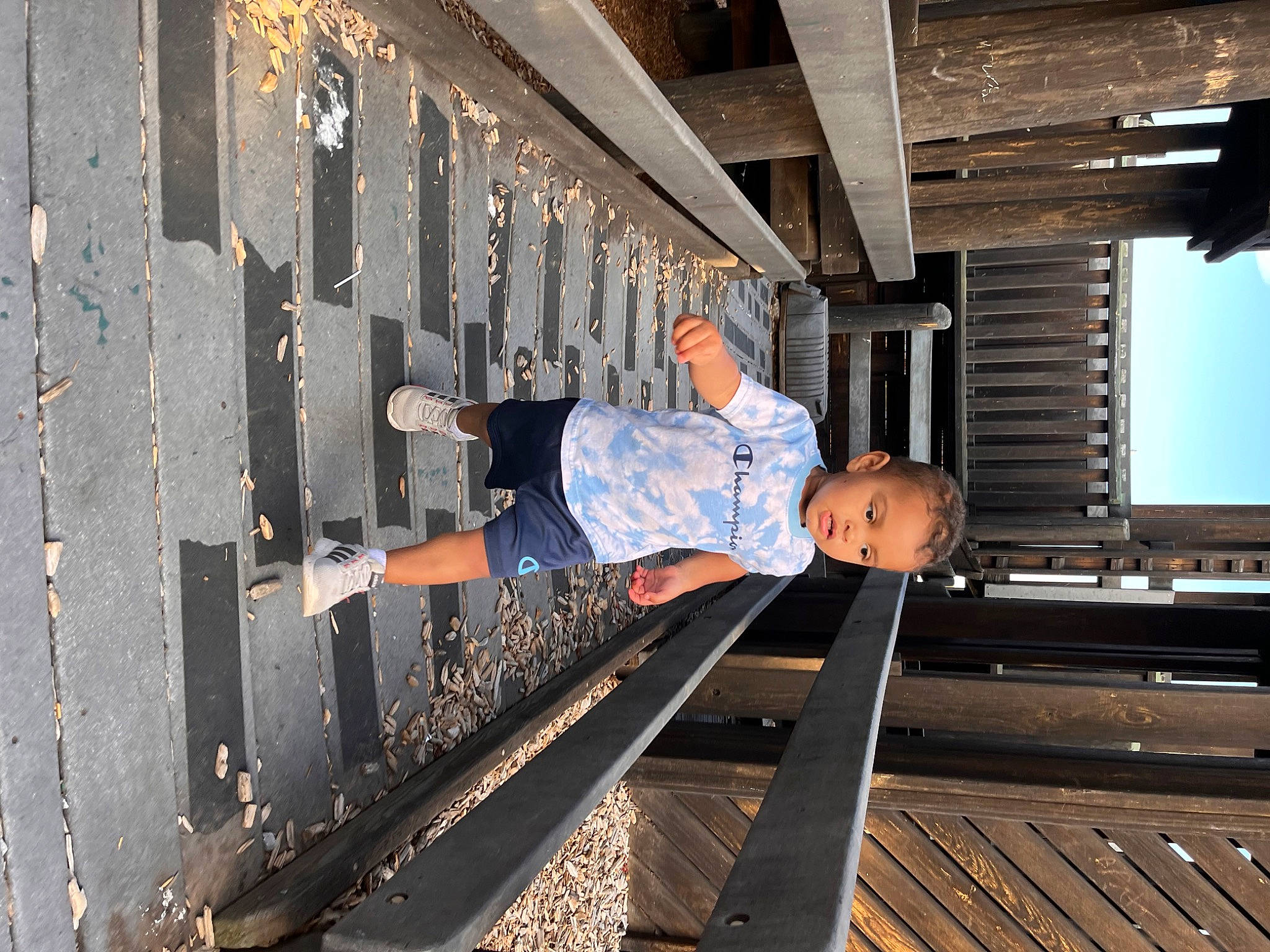 Miguel Wilson is registered to the contest to win money with this photo: auto_part, automotive_tire, automotive_wheel_system, beam, denim, electric_blue, engineering, flash_photography, handrail, leisure, metal, person, railway, rolling, stairs, steel, t_shirt, toddler, track, transport