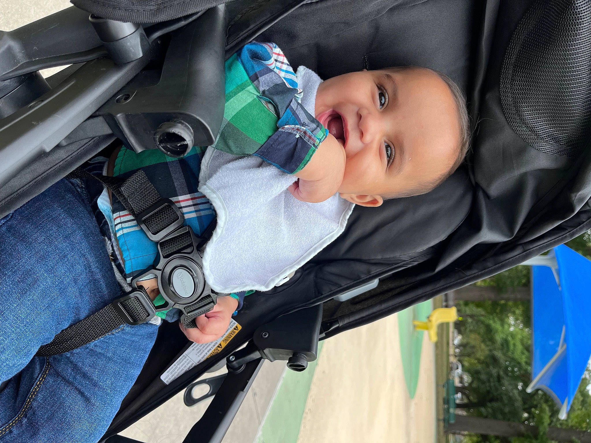 Taron Jr is registered to the contest to win money with this photo: auto_part, automotive_lighting, baby, baby_carriage, baby_products, baby_toddler_clothing, car_seat, car_seat_cover, child, comfort, electric_blue, happy, person, personal_luxury_car, seat_belt, smile, steering_wheel, toddler, tree, vehicle_door