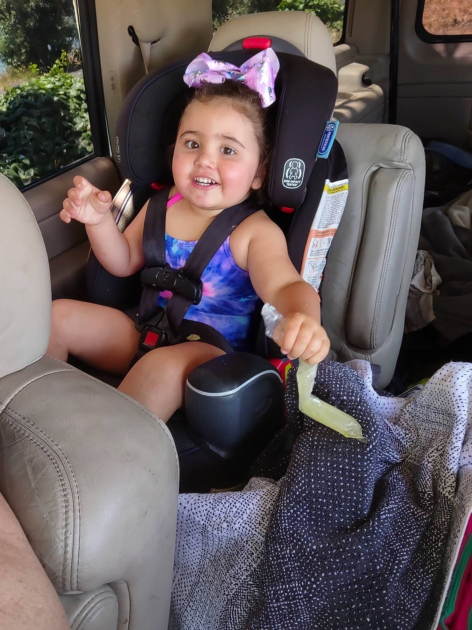 Malayah joined the competition — help win amazing prizes! arm, automotive_design, black_hair, car_seat, car_seat_cover, comfort, event, family_car, fun, happy, human_body, human_leg, joy, lap, leisure, motor_vehicle, person, sitting, smile, steering_wheel