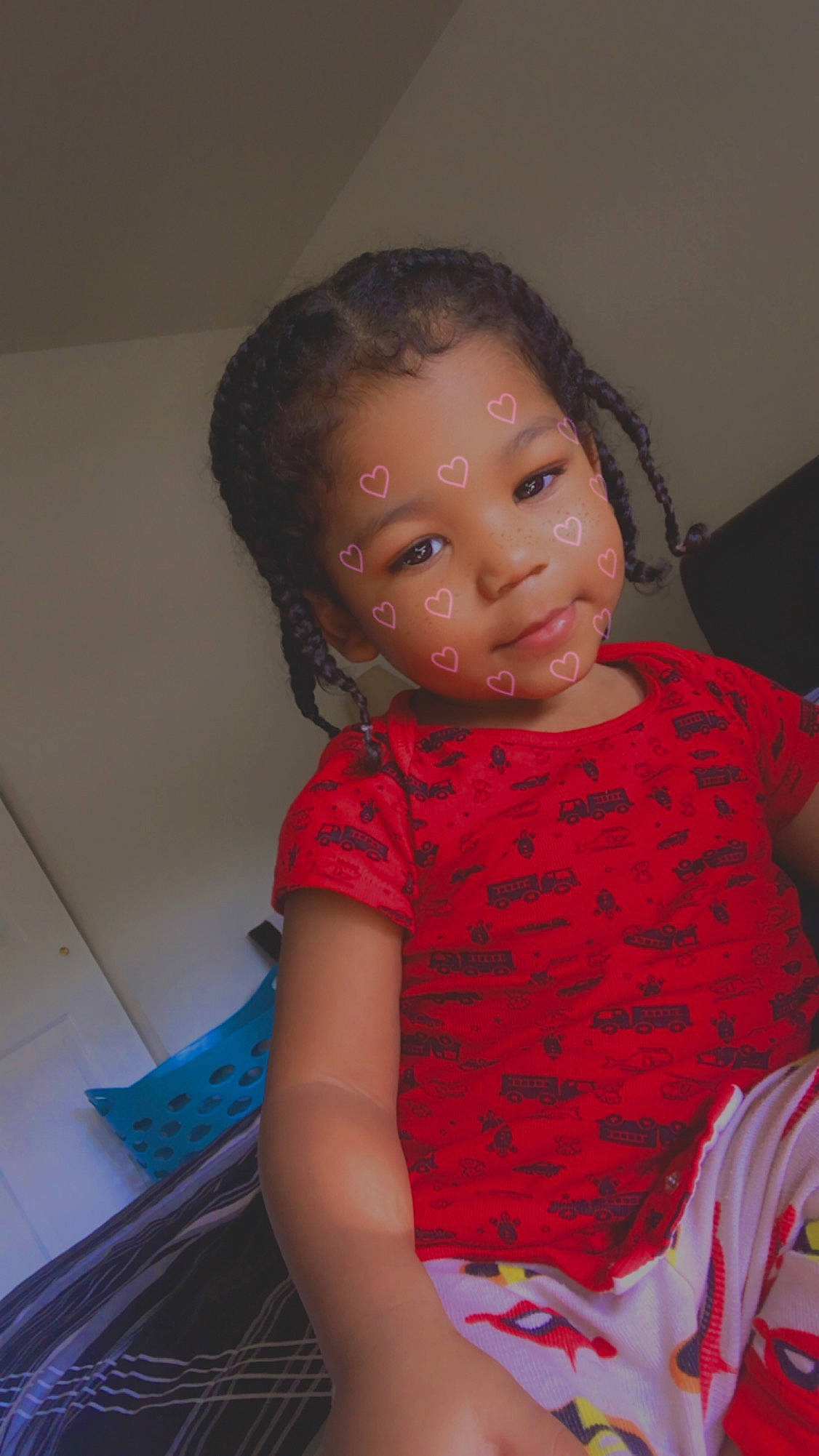 Jayceon is registered to the contest to win money with this photo: arm, baby, cheek, child, chin, eye, face, forehead, head, iris, lip, mouth, neck, nose, organ, person, pink, skin, smile, standing