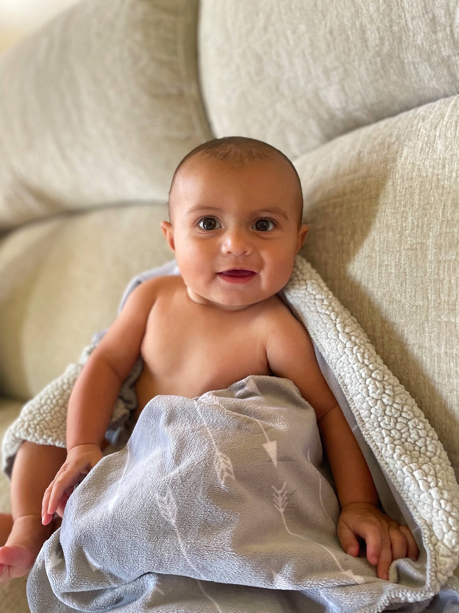 Gatlin joined the competition — help win amazing prizes! baby, baby_toddler_clothing, blond, cheek, child, comfort, eye, eyebrow, face, flash_photography, hairstyle, happy, iris, joy, linens, person, skin, smile, stomach, textile