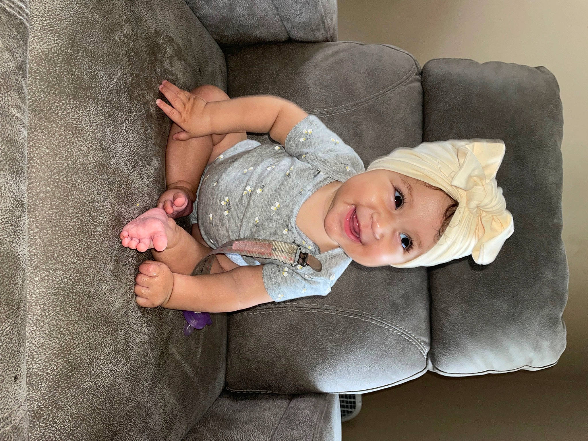 Ailani joined the competition — help win amazing prizes! baby, baby_toddler_clothing, blond, cheek, comfort, eye, finger, gesture, hand, hat, headwear, human_body, human_leg, joy, leg, linens, person, skin, sleeve, smile