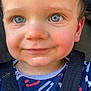 baby, blue_eyes, child, close_up, clothing, cute, expression, face, hair, happy, outdoor, patterned_shirt, person, portrait, skin, smile, straps, stroller, toddler, young_child