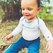 Jacob joined the competition — help win amazing prizes! baby, blue_pants, casual, champion_brand, child, clothing, cute, daylight, grass, happy, nature, outdoor, person, playful, portrait, sitting, smiling, toddler, white_shirt, young_child