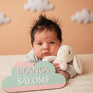 Blanca Salomé joined the competition — help win amazing prizes! baby, bunny, child, cloud_sign, cozy, cute, decorations, face, indoor, infant, knitted_blanket, lying_down, name_sign, nursery, pastel_colors, person, plush_toy, portrait, soft_lighting, spiky_hair