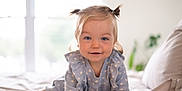 Piper joined the competition — help win amazing prizes! toddler, child, baby, pigtails, blue_eyes, polka_dot, clothing, bed, indoor, crawling, smiling, cute, soft_light, window, blanket, furniture, plant, portrait, happy, home