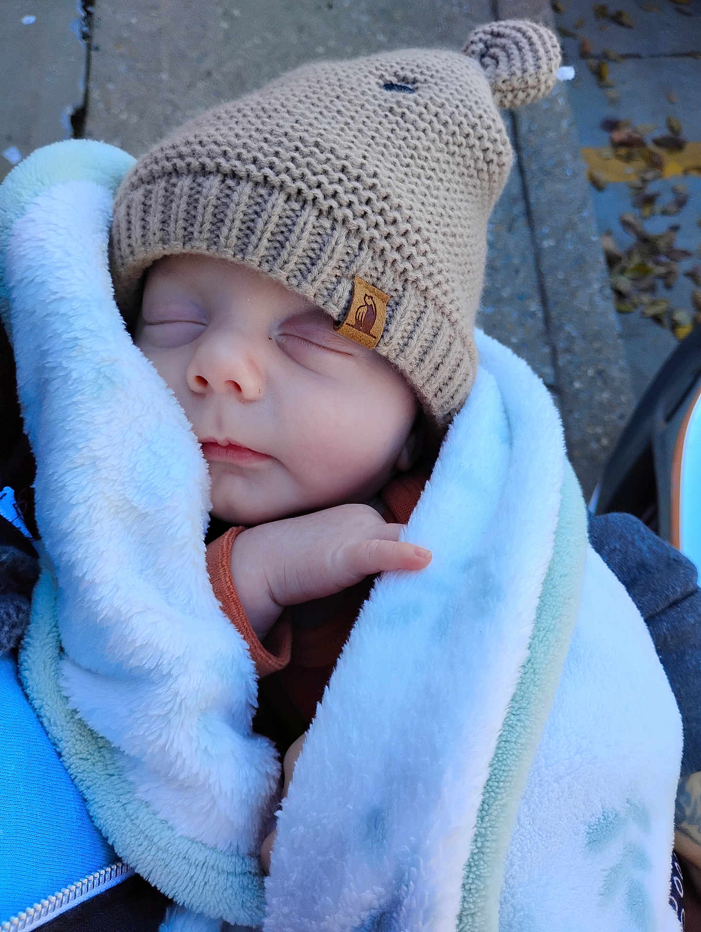 Brantley joined the competition — help win amazing prizes! baby, sleeping, blanket, hat, knitted_hat, cozy, cute, child, infant, outdoor, warm, soft, face, hands, person, closeup, peaceful, wrapped, winter, adorable