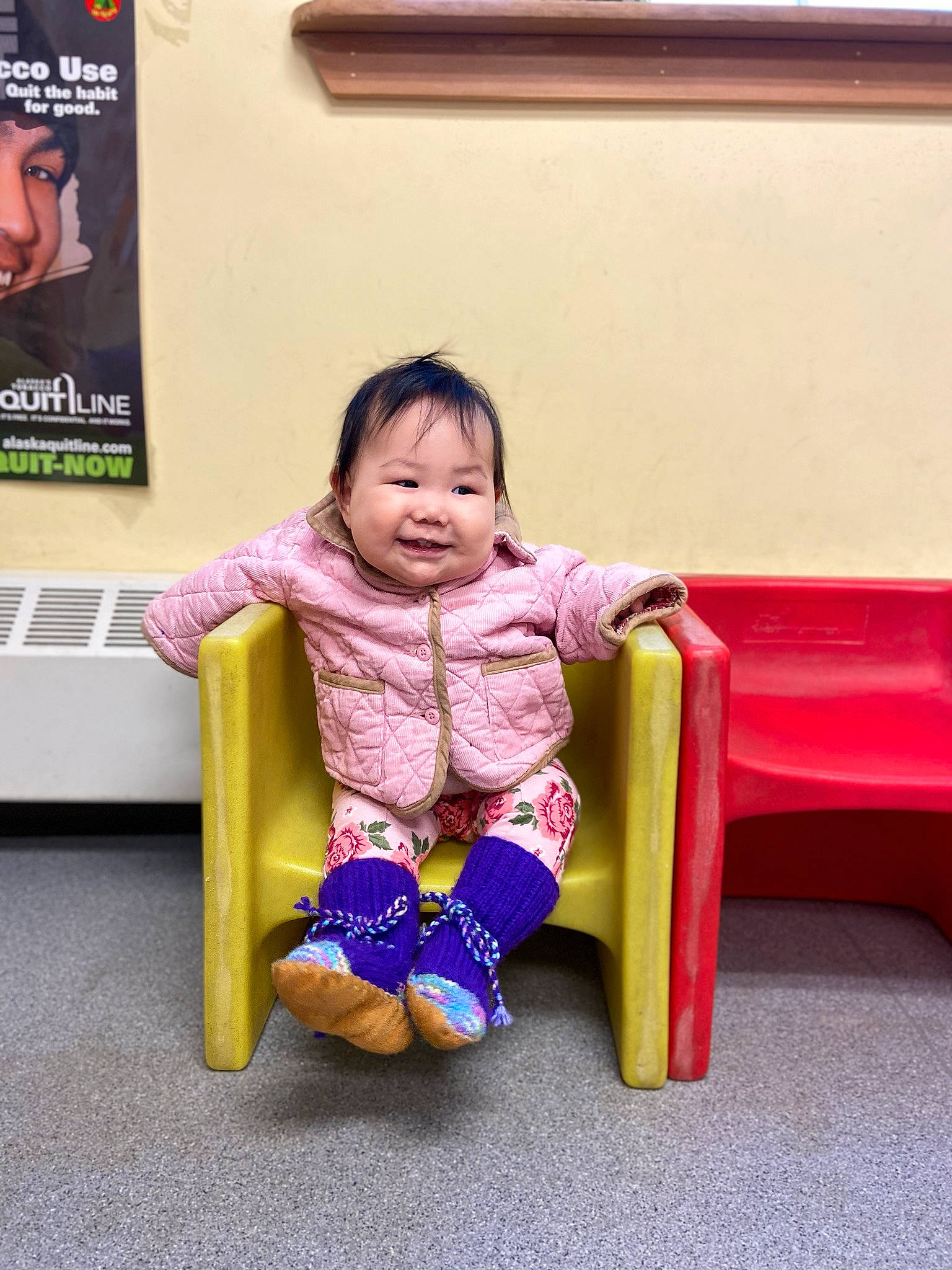 Susan is registered to the contest to win money with this photo: baby, beauty, child, facial_expression, fun, furniture, joy, magenta, person, pink, play, sitting, skin, smile, toddler, yellow