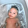 Noah Paul Augustin participe au concours pour gagner de l'argent avec cette photo : baby, bath, bathing, child, clean, cute, expression, face, foam, hand, hygiene, indoors, infant, relaxing, skin, swimming, tub, water, wet, young