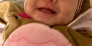 Allyannah joined the competition — help win amazing prizes! baby, blanket, bonnet, cap, clothing, coat, face, happy, hat, head, hood, jacket, laughing, newborn, person, photography, portrait, quilt, selfie, smile