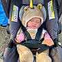 accessories, baby, bonnet, cap, car, clothing, coat, face, footwear, hat, head, person, photography, portrait, shoe, sleeping, stroller, sunglasses, transportation, vehicle