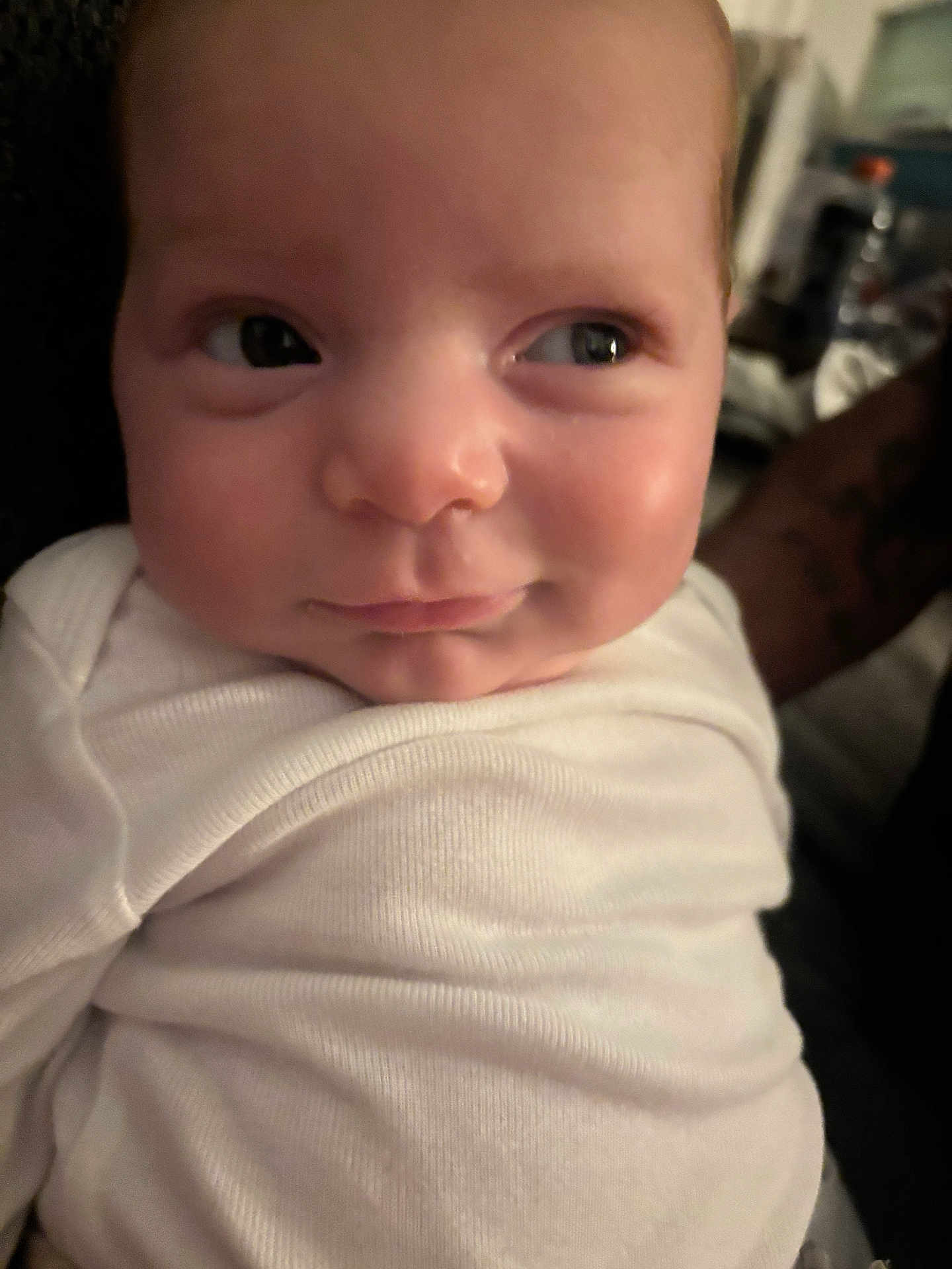 Jaxson joined the competition — help win amazing prizes! baby, infant, face, eyes, skin, white_clothing, portrait, closeup, human, cute, newborn, expression, young_child, child, indoors, person, sleepwear, soft_lighting, cheeks, curious