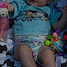 Rosalee joined the competition — help win amazing prizes! baby, infant, child, bow, headband, blue_shirt, diaper, blanket, toy, bottle, feet, cute, lying_down, colorful, playtime, portrait, indoors, happy, face, person