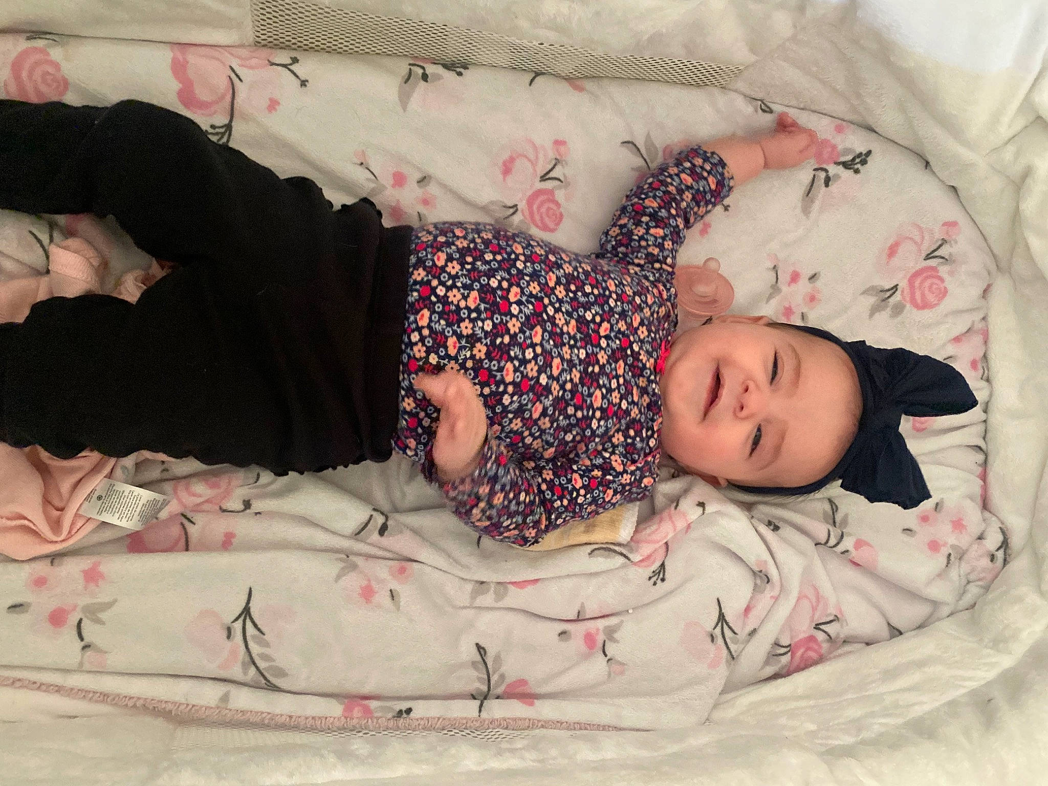 Paisley joined the competition — help win amazing prizes! baby, baby_toddler_clothing, bed, bed_sheet, bedding, bedroom, bedtime, child, comfort, facial_expression, human, linens, pattern, person, pink, product, room, skin, sleeve, t_shirt