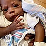 architecture, baby, babylaughing, biting, building, crying, face, happy, head, hospital, person, sad, smile