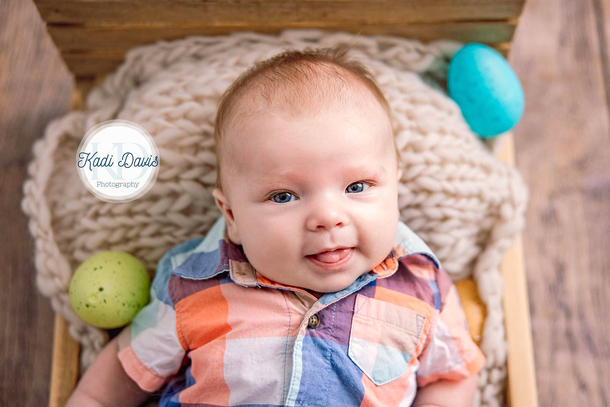 Kru is registered to the contest to win money with this photo: baby, baby_products, baby_toddler_clothing, blue, child, fun, green, happy, leisure, linens, nose, person, product, room, skin, smile, sports_equipment, tennis_ball, textile, toddler