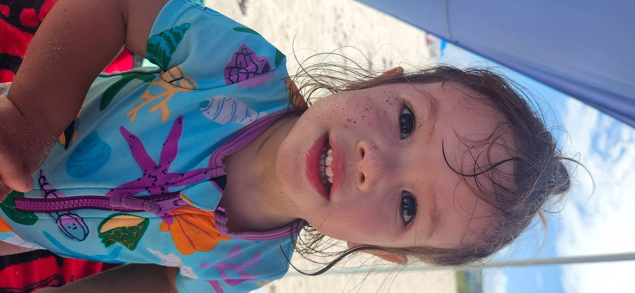 Rose is registered to the contest to win money with this photo: azure, cheek, electric_blue, eyelash, eyewear, fun, happy, jaw, leisure, lip, mouth, neck, nose, person, plant, skin, smile, toddler, tree, water