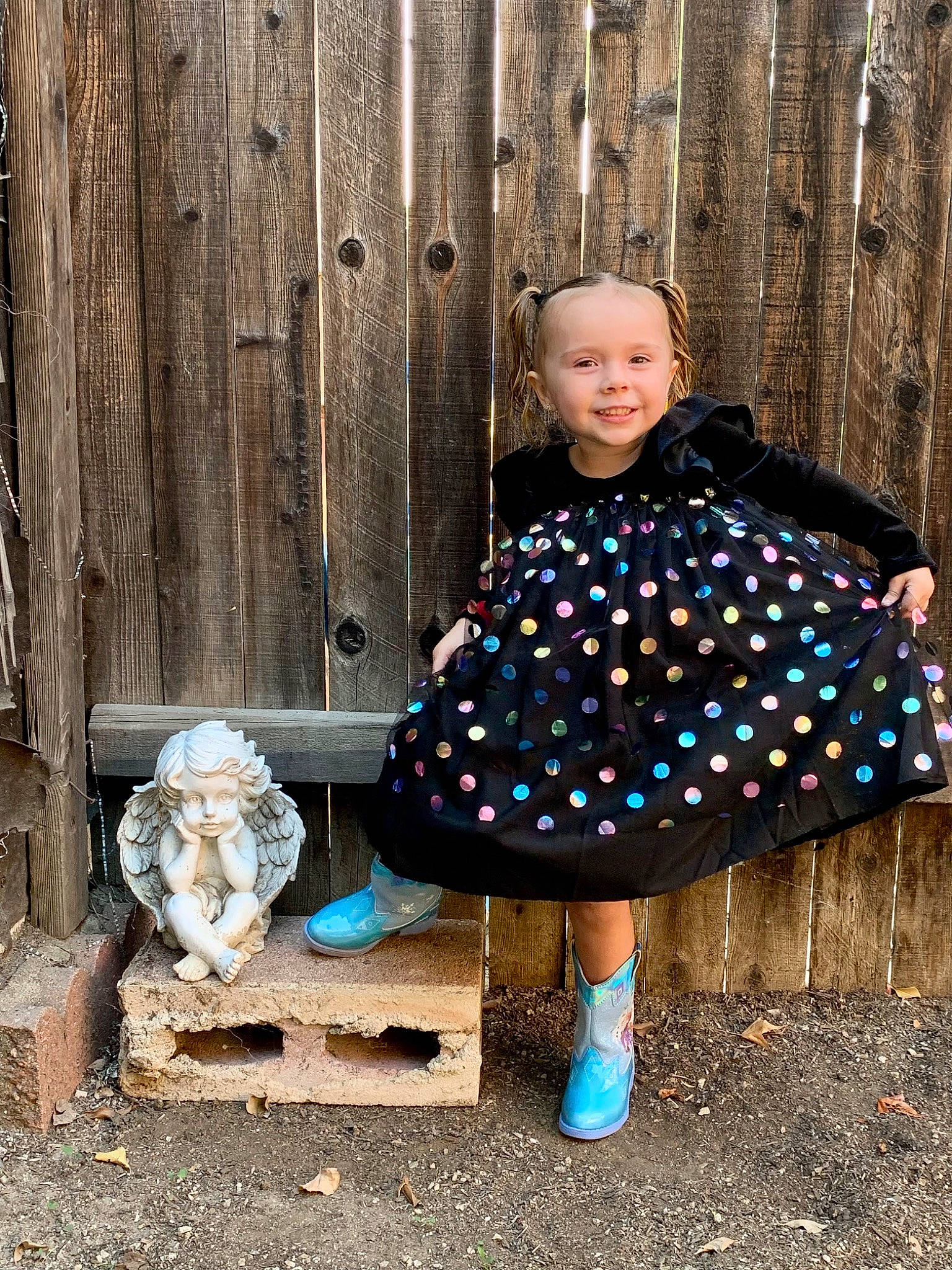 Keira is registered to the contest to win money with this photo: baby_toddler_clothing, child, electric_blue, grass, human_body, human_leg, jacket, joy, knee, pattern, people_in_nature, person, plaid, sitting, sleeve, standing, textile, toddler, tree, vintage_clothing