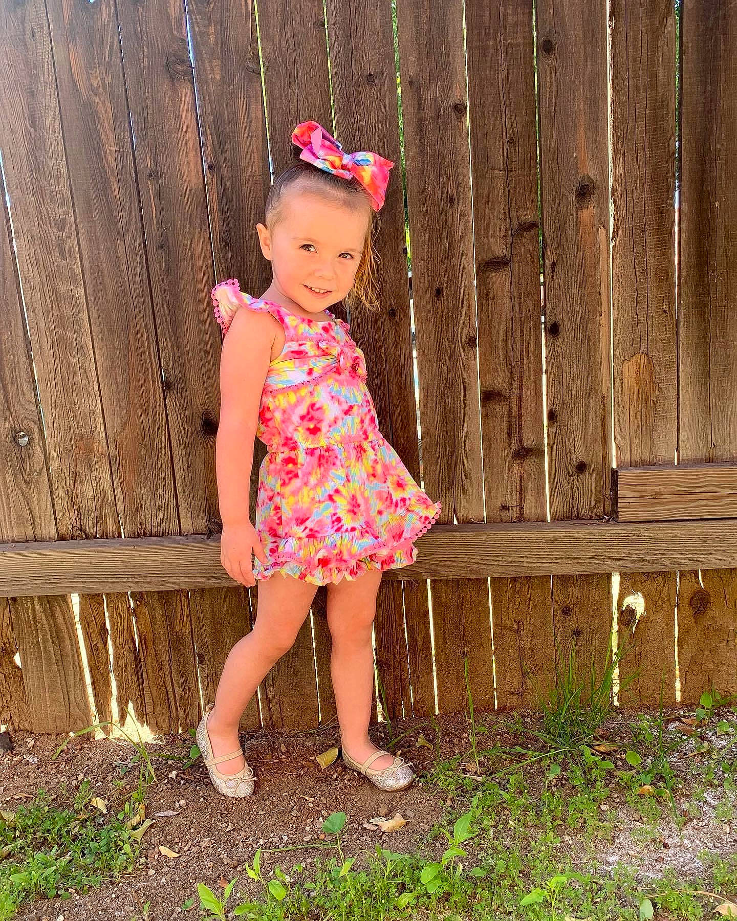 Keira joined the competition — help win amazing prizes! baby_toddler_clothing, child, clothing, day_dress, fashion_accessory, fun, grass, happy, human_leg, joy, magenta, one_piece_garment, pattern, people_in_nature, person, pink, sitting, sleeve, spring, toddler