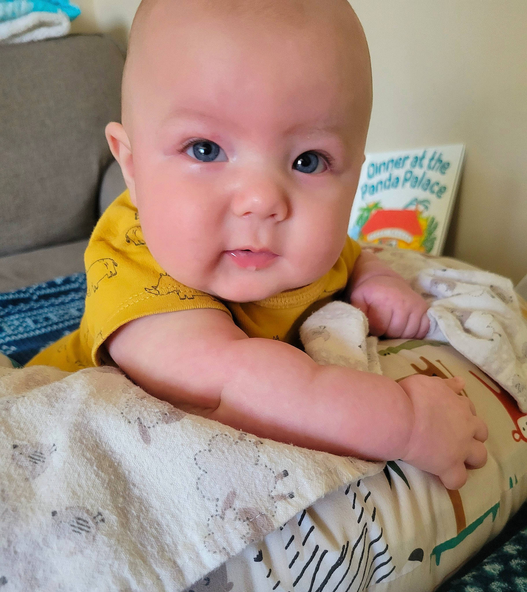 Evan is registered to the contest to win money with this photo: baby, baby_products, baby_safety, baby_sleeping, baby_toddler_clothing, cheek, comfort, eye, eyelash, facial_expression, finger, happy, iris, linens, neck, person, skin, sleeve, stomach, textile