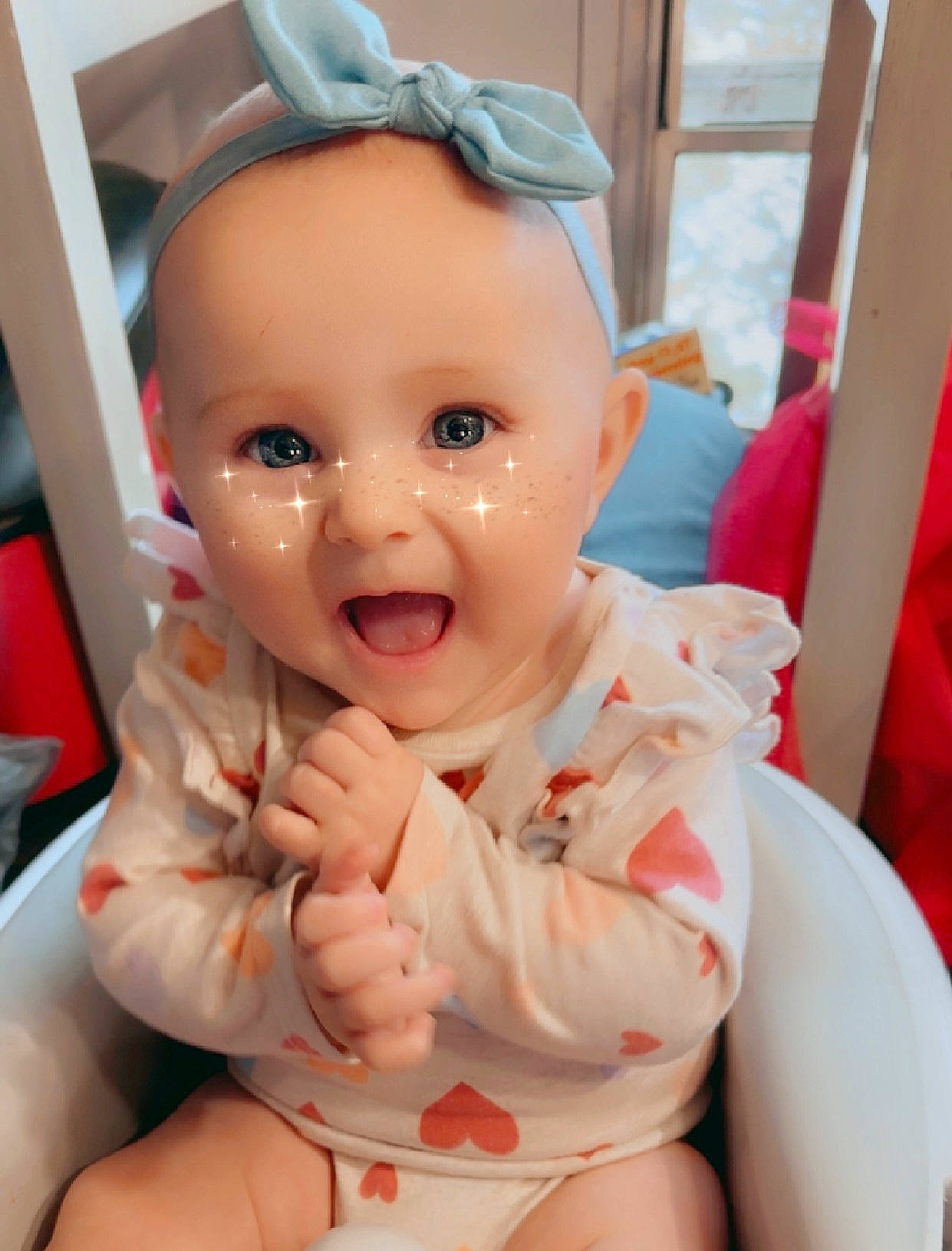 Ashlynn is registered to the contest to win money with this photo: baby, baby_toddler_clothing, cheek, chin, comfort, eye, eyelash, face, finger, gesture, happy, human_body, lip, mouth, neck, nose, person, pink, skin, thigh