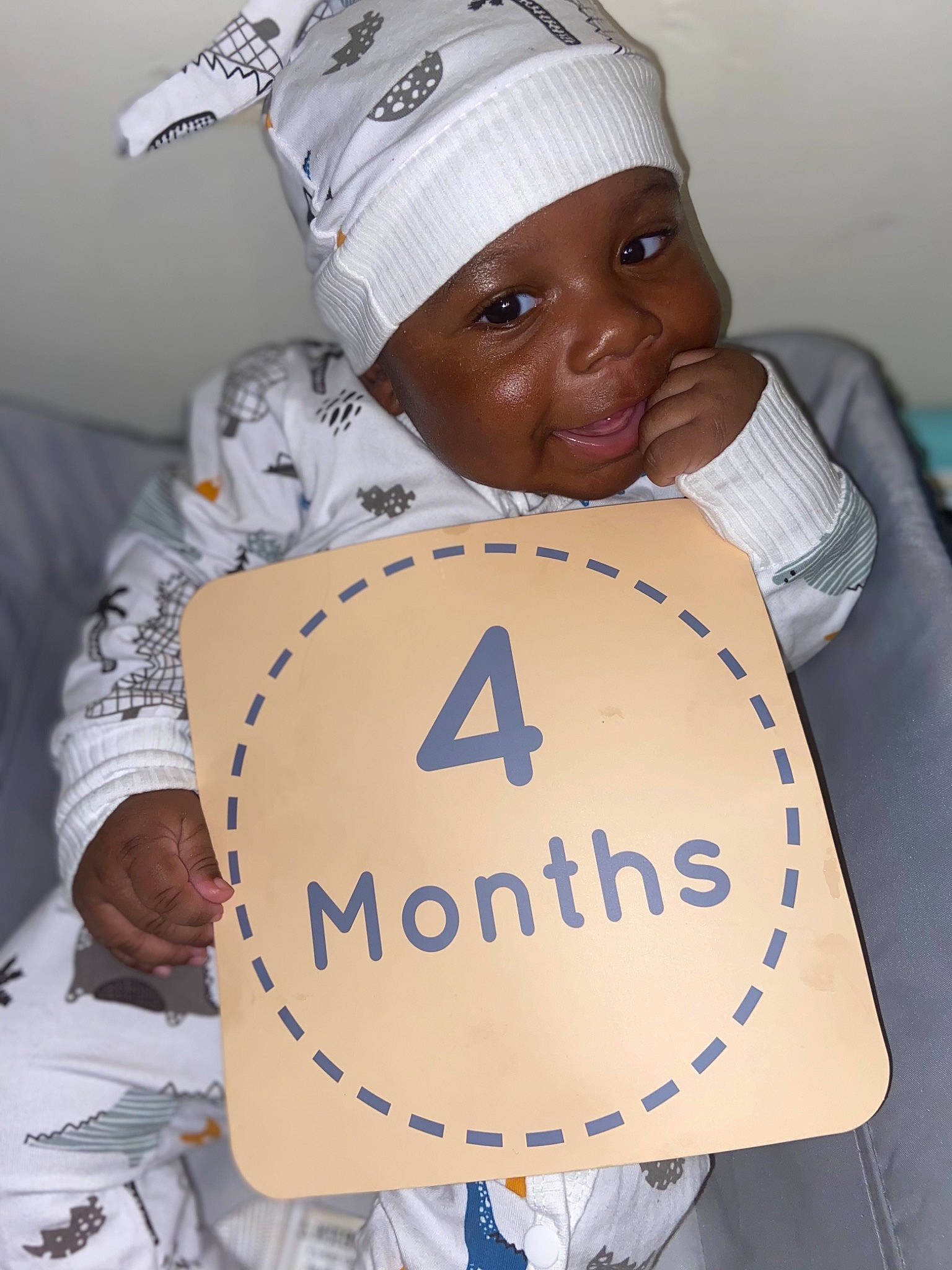 Tyrone joined the competition — help win amazing prizes! art, baby, baseball_cap, cap, cat, child, comfort, event, felidae, finger, font, gesture, happy, hat, headgear, headwear, linens, person, smile, t_shirt