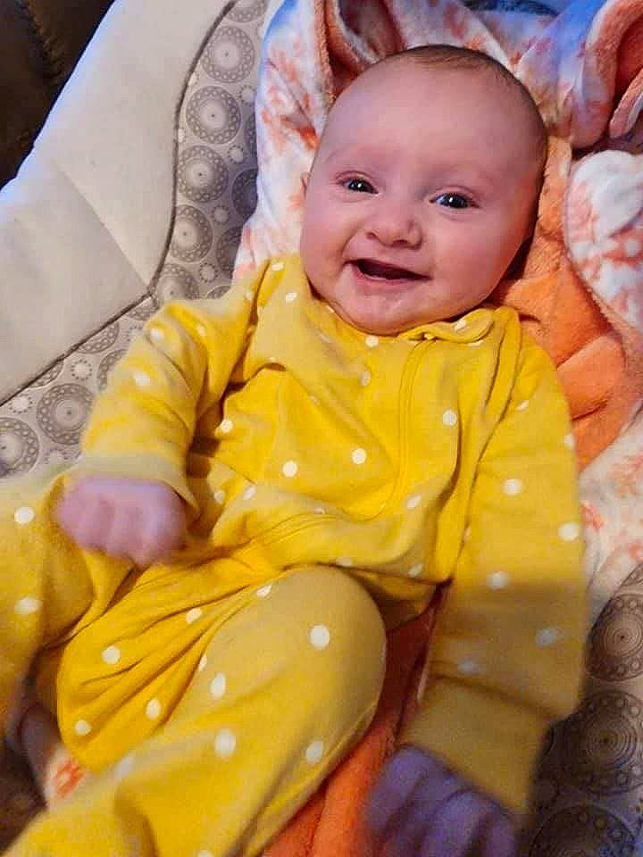 Liliana joined the competition — help win amazing prizes! baby, baby_laughing, baby_products, baby_toddler_clothing, chair, cheek, child, comfort, eye, fun, grass, happy, iris, lap, person, sitting, skin, sleeve, smile, thigh