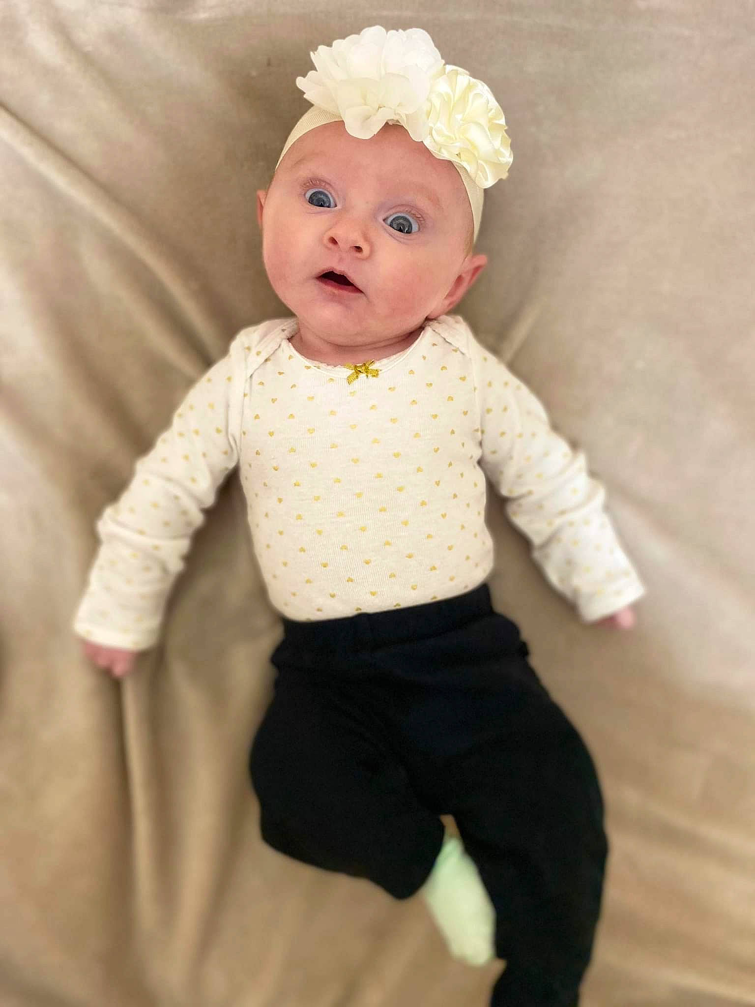 Liliana joined the competition — help win amazing prizes! arm, baby_toddler_clothing, child, eye, facial_expression, fashion_design, finger, gesture, hand, happy, head, headgear, headwear, human_body, outerwear, pattern, person, sleeve, standing, surprise