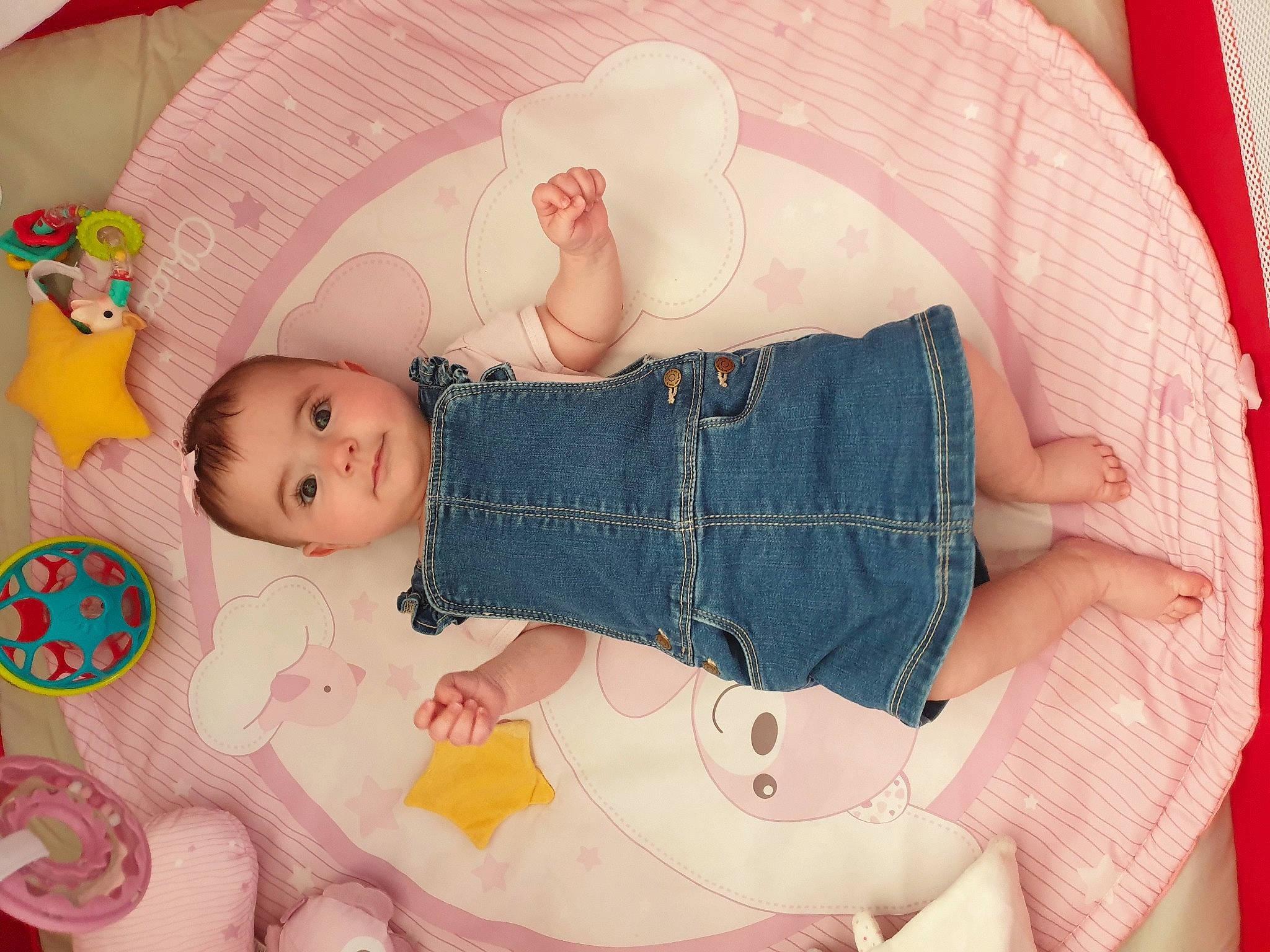 Hanaé participe au concours pour gagner de l'argent avec cette photo : arm, baby, baby_products, baby_sleeping, baby_toddler_clothing, cheek, child, comfort, doll, dress, headgear, human_body, jeans, linens, pattern, person, pink, skin, sleeve, textile