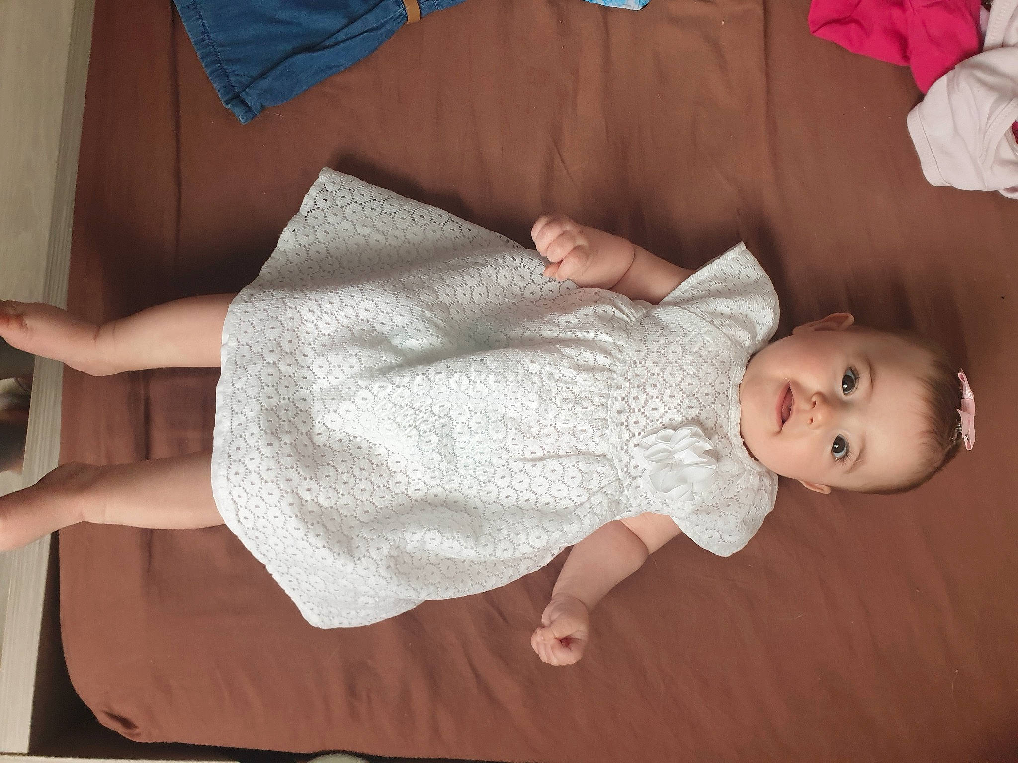 Hanaé participe au concours pour gagner de l'argent avec cette photo : baby, baby_products, baby_toddler_clothing, cheek, child, comfort, dress, finger, hand, human_body, human_leg, joint, joy, leg, pattern, person, skin, sleeve, textile, toddler