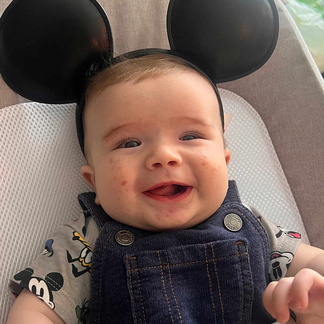 Kalel joined the competition — help win amazing prizes! baby, bodypart, chair, clothing, couch, cushion, face, finger, furniture, hand, happy, head, homedecor, jeans, pants, person, photography, portrait, sitting, smile