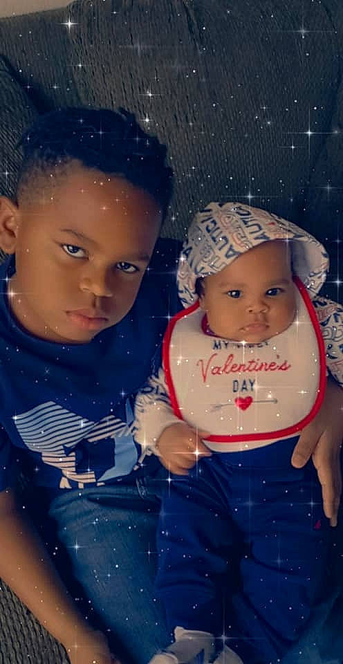 Gregory is registered to the contest to win money with this photo: baby, cheek, child, headwear, person, sibling, smile, space, toddler