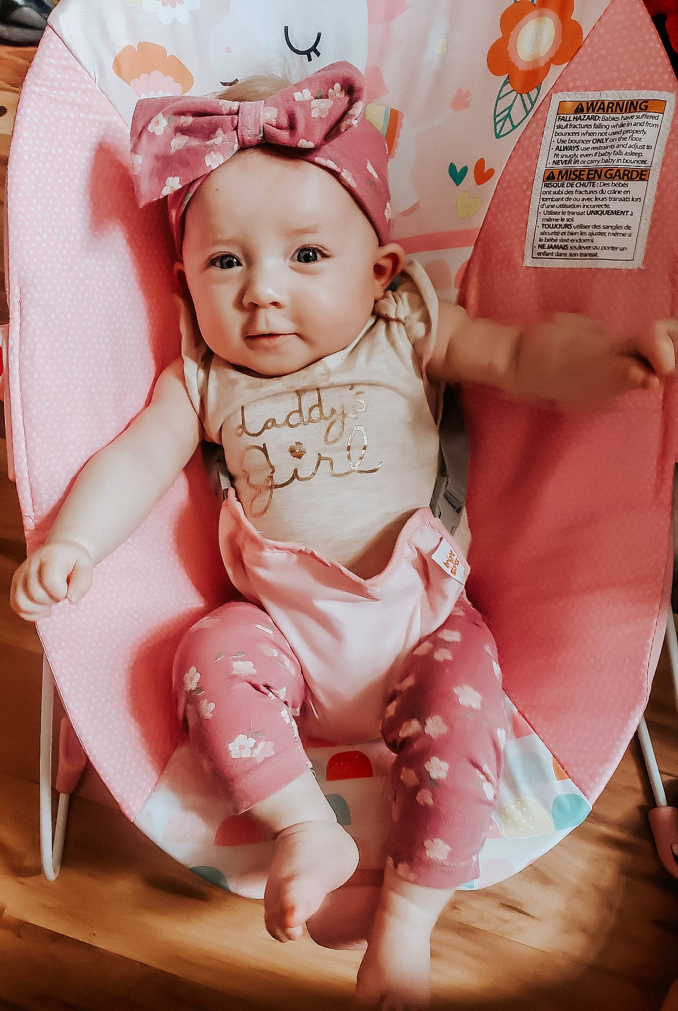 Saoirse joined the competition — help win amazing prizes! baby, baby_products, baby_toddler_clothing, chair, cheek, child, comfort, eyelash, fashion_accessory, finger, foot, fun, happy, headband, headwear, jewellery, magenta, peach, person, pink