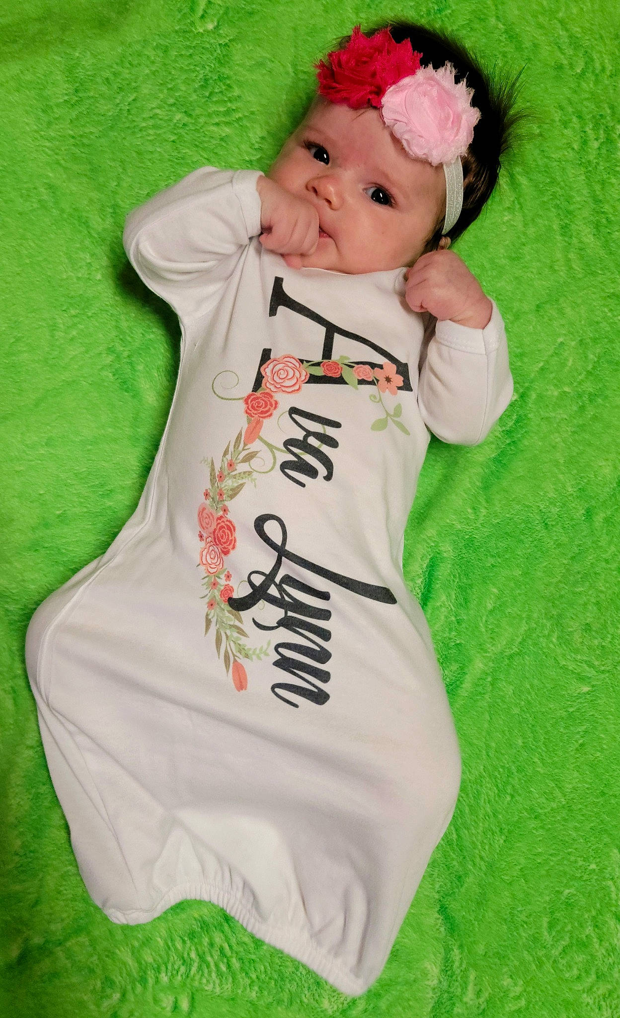 Ava-lynn is registered to the contest to win money with this photo: baby, baby_products, baby_toddler_clothing, cap, carmine, child, costume_hat, face, fur, grass, happy, hat, head, headwear, linens, pattern, peach, person, sleeve, smile