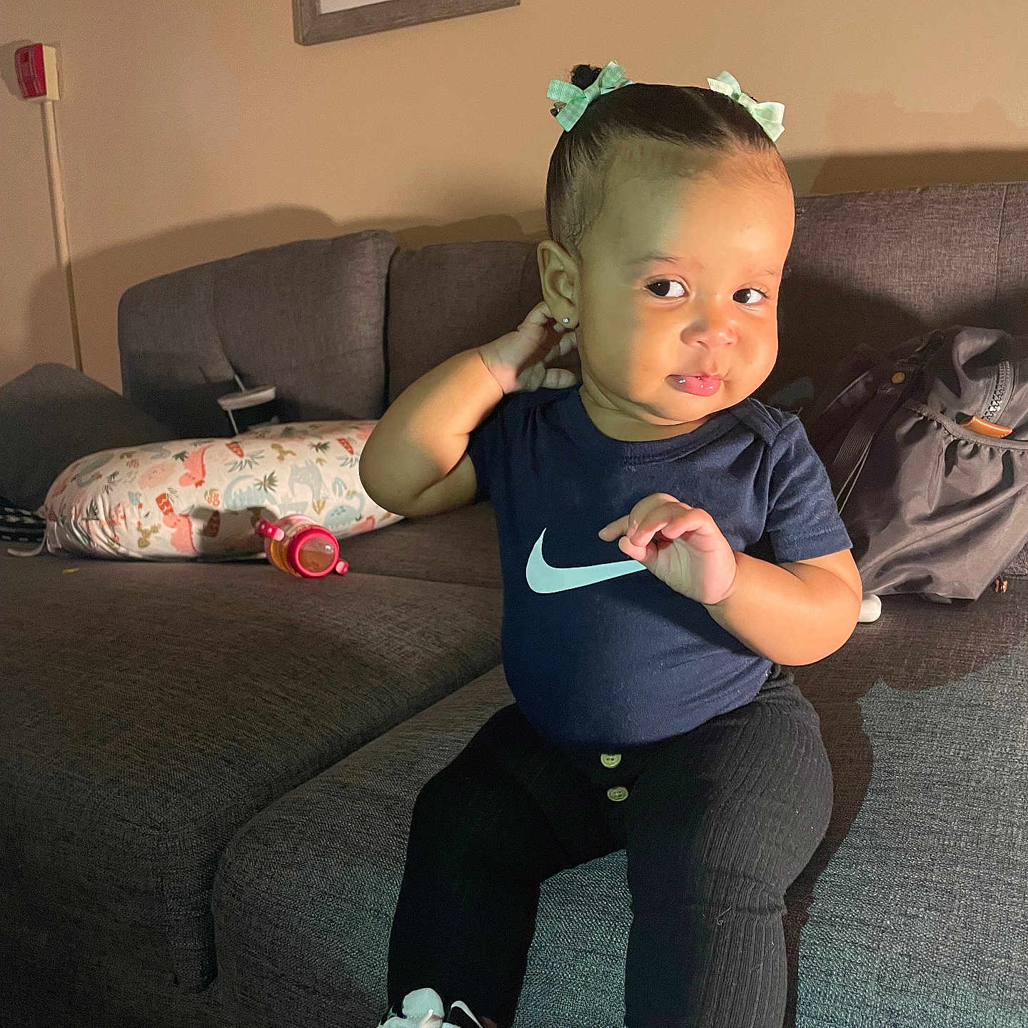 Sarai Rumani joined the competition — help win amazing prizes! architecture, baby, bodypart, building, clothing, couch, face, footwear, furniture, head, indoors, livingroom, pants, person, photography, portrait, room, shoe, sitting, sneaker