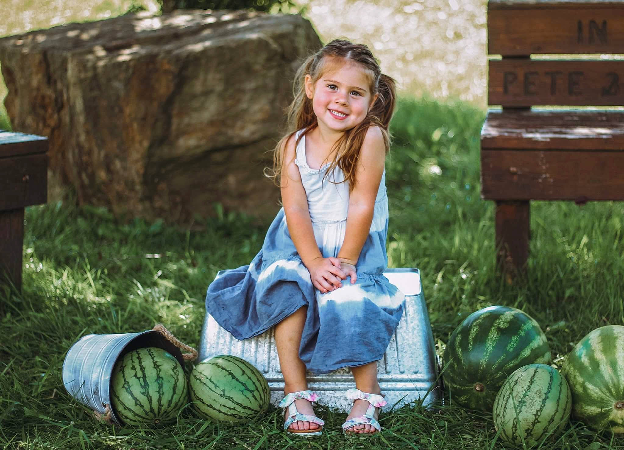 Aleigha is registered to the contest to win money with this photo: botany, citrullus, fruit, fun, grass, grass_family, green, happy, head, jeans, joy, leisure, melon, people, people_in_nature, person, plant, recreation, smile, toddler