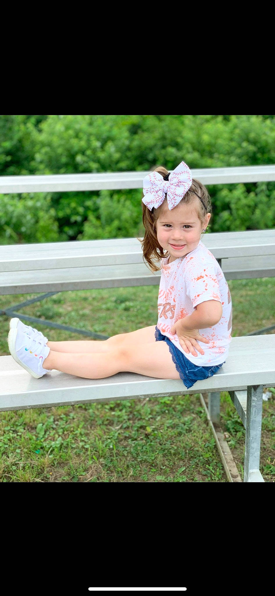 Aleigha joined the competition — help win amazing prizes! baby_toddler_clothing, blond, child, face, fun, grass, green, happy, headwear, human_leg, joy, leisure, person, pink, plant, recreation, shorts, sitting, skin, smile