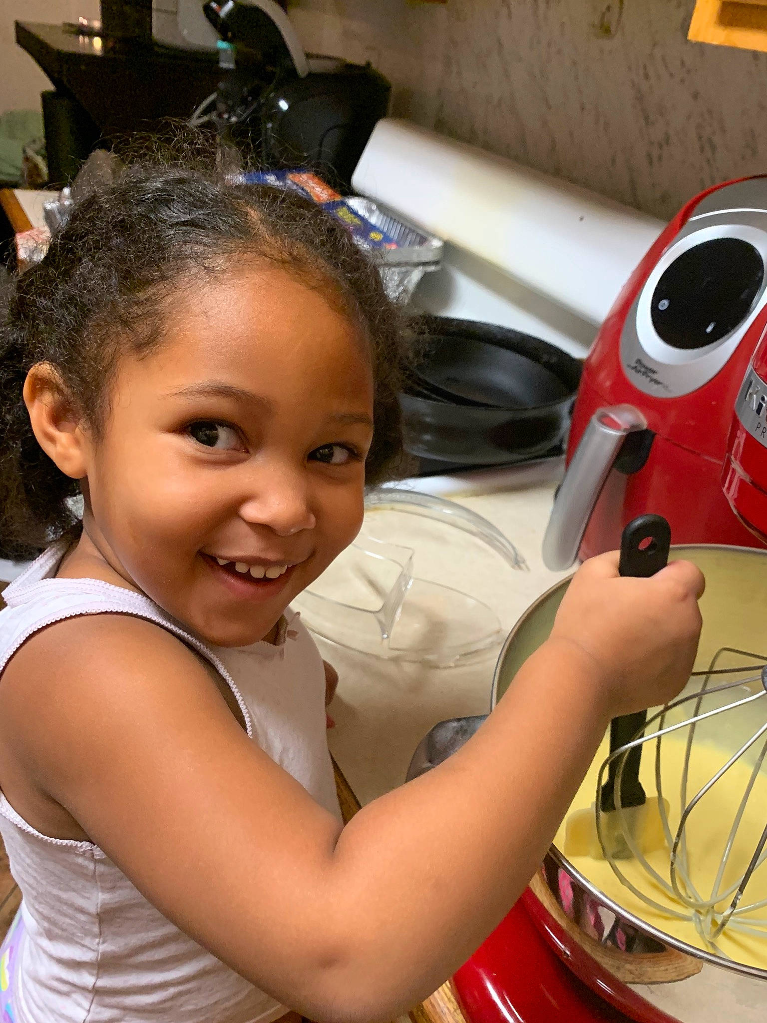 Cynthia is registered to the contest to win money with this photo: child, joy, person, small_appliance