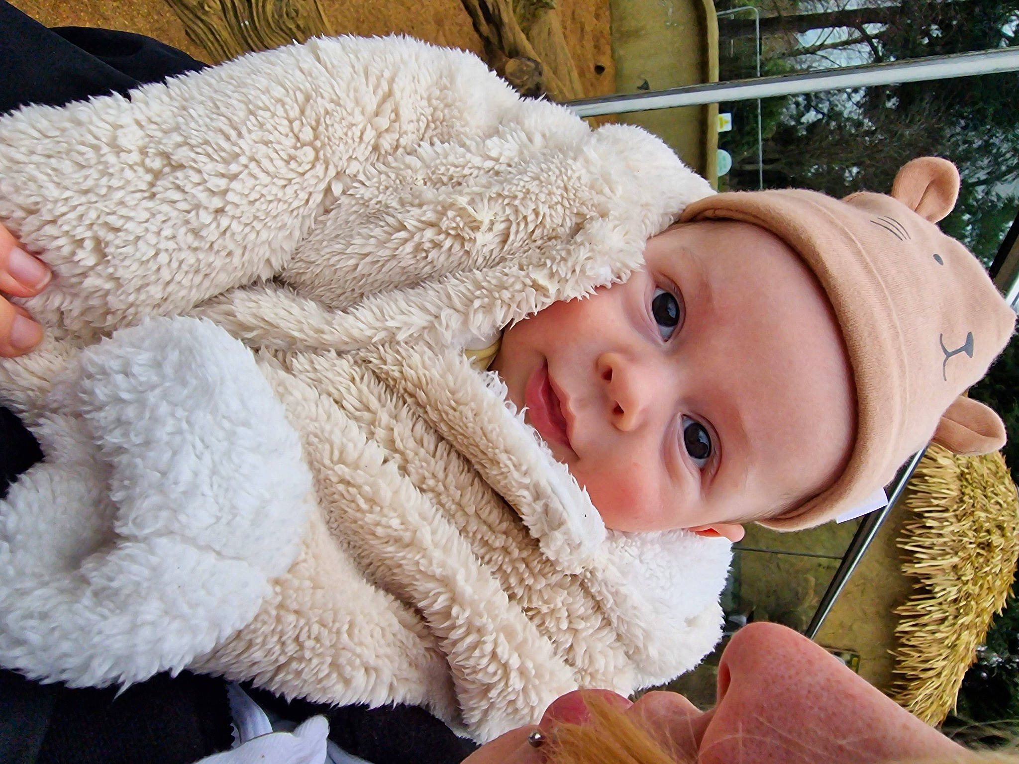 Yuno joined the competition — help win amazing prizes! baby, baby_toddler_clothing, cap, cheek, child, comfort, eye, fur, fur_clothing, grass, happy, hat, headgear, headwear, knit_cap, nose, person, skin, toddler, tree