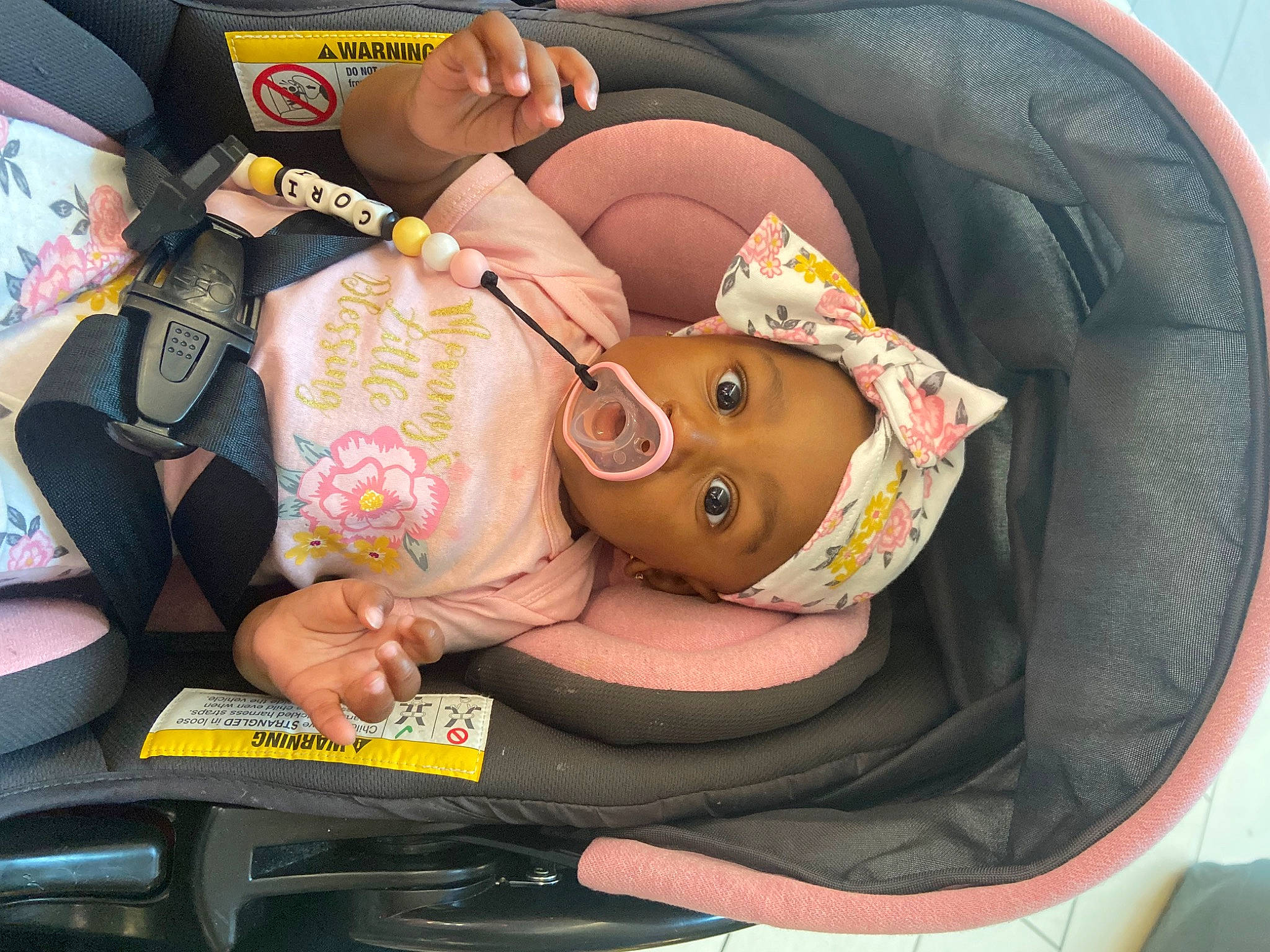 Cori is registered to the contest to win money with this photo: auto_part, automotive_design, automotive_exterior, baby_carriage, baby_in_car_seat, baby_products, car, car_seat, car_seat_cover, child, comfort, eyewear, family_car, fun, luxury_vehicle, motor_vehicle, person, seat_belt, steering_wheel, trunk