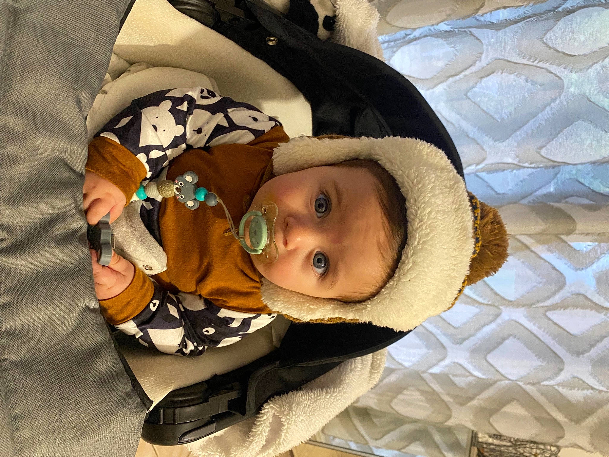 Enes participe au concours pour gagner de l'argent avec cette photo : baby, baby_carriage, baby_products, baby_safety, baby_sleeping, baby_toddler_clothing, beanie, cap, cheek, child, comfort, eye, fashion_accessory, headgear, knit_cap, linens, outerwear, person, sleeve, toddler