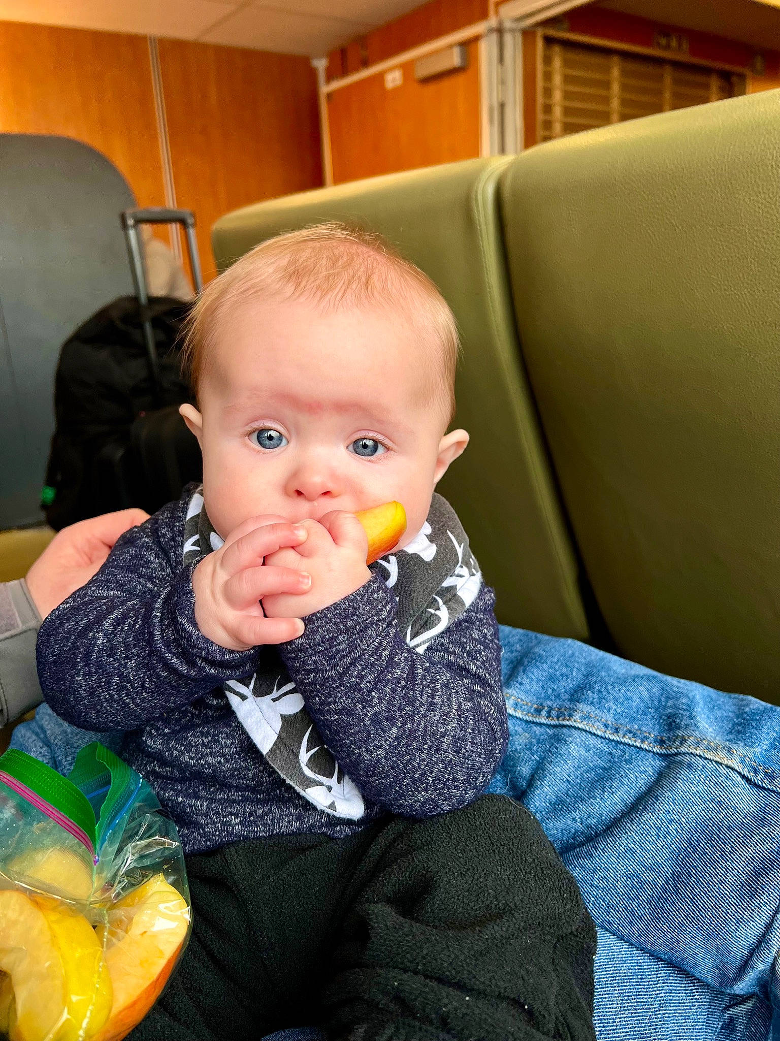 Mccoy is registered to the contest to win money with this photo: baby, baby_toddler_clothing, chair, cheek, child, comfort, couch, flooring, fruit, fun, iris, lap, person, room, sitting, toddler